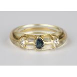 A Pascal Morabito gold, sapphire and diamond ring, encased in resin, ring size approx M1/2, with a