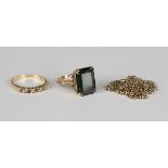 A 9ct gold ring, claw set with a rectangular step cut synthetic green spinel, an 18ct gold and