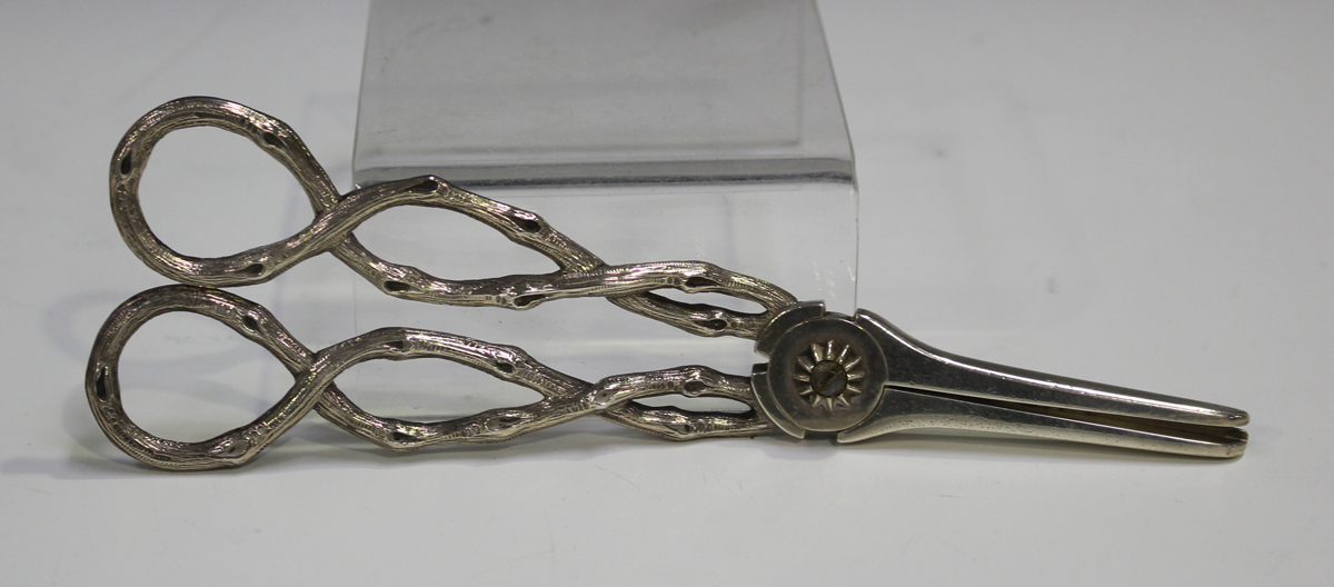 A pair of Victorian silver grape shears, each handle of naturalistic entwined vine form, London 1874