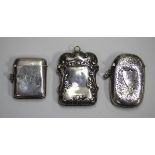 A late Victorian silver vesta case with shaped foliate borders, Birmingham 1899 by Elkington & Co,