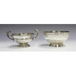 A Victorian silver circular sugar bowl with engraved foliate band, London 1880 by Edward Hutton,