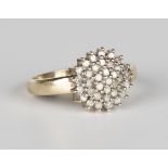 A 9ct gold and diamond cluster ring, mounted with circular cut diamonds, ring size approx Q1/2.