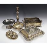A collection of plated items, including a rectangular entrée dish, cover and handle with a two-