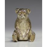 An Edwardian silver novelty pepper castor in the form of seated teddy bear, Birmingham 1909 by Henry