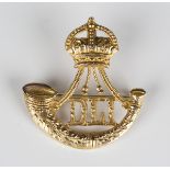 A 9ct gold regimental brooch, designed as the badge of the Durham Light Infantry, Birmingham 1914,
