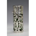 A late Victorian silver cased green glass scent bottle and stopper, the cylindrical body with