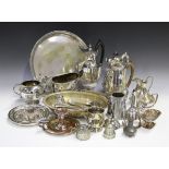 A collection of assorted plated items, including two entrées dishes, a salver and two hot water