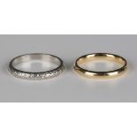 A gold wedding ring, detailed '14K', ring size approx L1/2, and another decorated wedding ring,