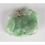 A jade pendant, carved and pierced in a fruit design with a butterfly, length 5cm, width 5cm.Buyer’s