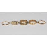 A 9ct gold rectangular signet ring, monogram engraved, and four 9ct gold wedding rings.Buyer’s
