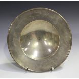 An Elizabeth II silver circular dish, the wide rim engraved with signatures, London 2002, diameter