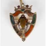 A Victorian Scottish citrine, carbuncle garnet, half-pearl and vari-coloured agate pendant brooch in