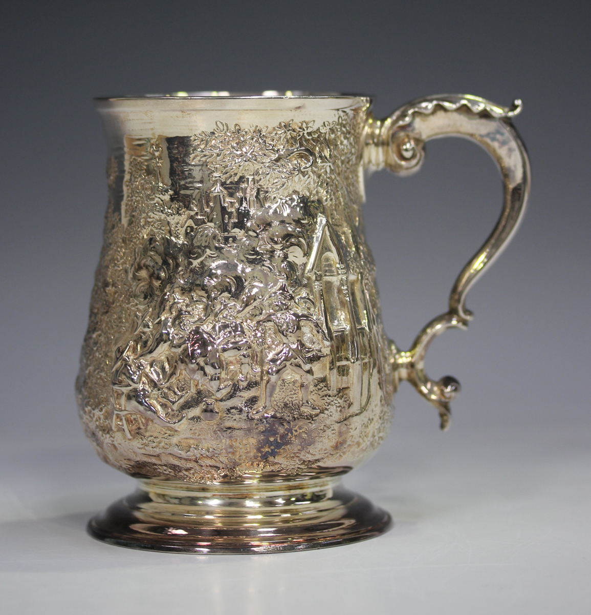 A George III silver tankard, the baluster body later embossed with a scene of figures seated and - Image 4 of 5