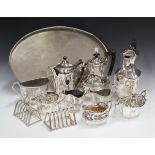A collection of assorted plated items, including an oval gallery tray and teaware.Buyer’s Premium