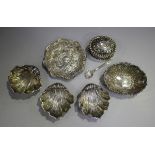 A pair of Edwardian silver scallop shell salts, Chester 1903, a similar silver salt, two small