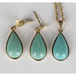 A gold mounted drop shaped turquoise pendant, length 2cm, with a 9ct gold neckchain, length 44cm,