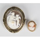 A Victorian gilt metal mounted oval shell cameo brooch, carved as a seated classical female figure