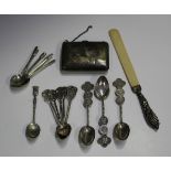 A George V silver purse, Birmingham 1915, a silver handled letter opener, Birmingham 1904, nine