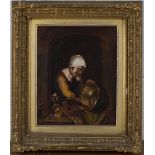 Follower of Godfried von Schalken - Woman cleaning a Pan, oil on panel, inscribed 'G. Schalken