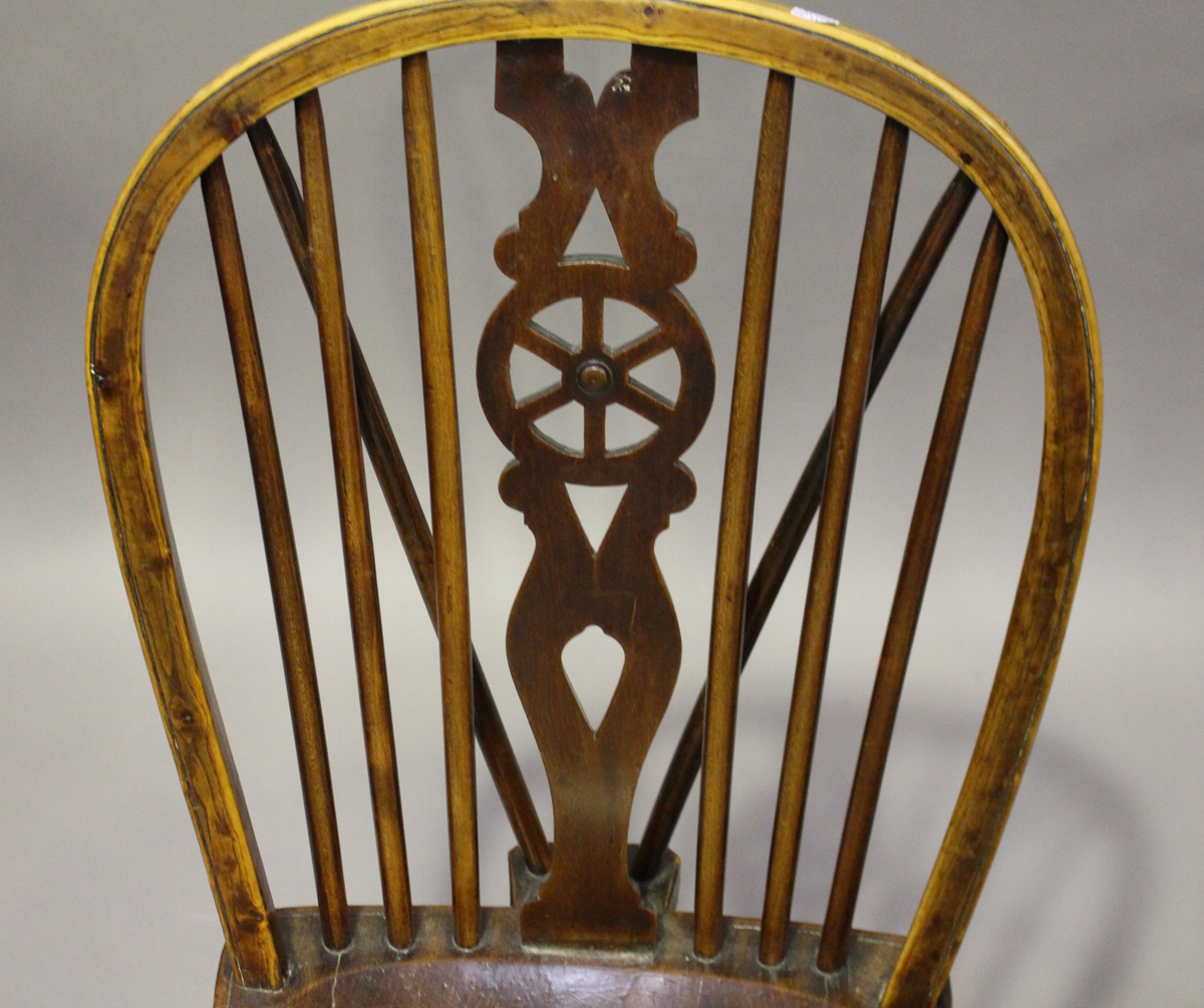 A harlequin set of four early Victorian ash and elm stick and wheel back Windsor dining chairs, - Image 3 of 9