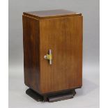 An Art Deco hardwood side cabinet, the door enclosing five drawers, height 91cm, width 50cm, depth