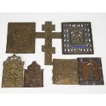 A group of mainly 19th century Russian cast brass icons, including a rectangular enamelled