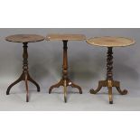 A Regency mahogany rectangular wine table, on a turned baluster column and tripod cabriole legs,