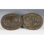 A pair of 19th century Continental cast bronze oval ornamental plaques, both depicting Classical