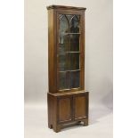 A 19th century mahogany narrow bookcase cabinet with lancet arch glazing, height 218cm, width