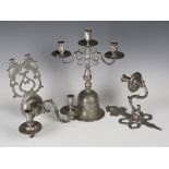 A 20th century pewter three-light candelabrum, height 39.5cm, together with a group of pewter wall