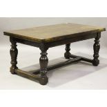 A modern Jacobean Revival oak drawleaf refectory table, raised on heavy turned baluster legs, height