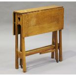 An Edwardian Arts and Crafts oak Sutherland occasional table, possibly retailed by Liberty & Co, the