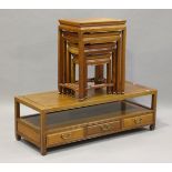 A modern Chinese hardwood quartetto nest of occasional tables, width 50.5cm, together with a similar