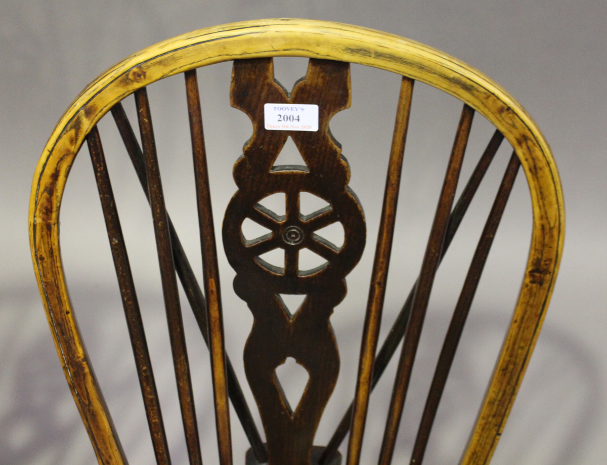 A harlequin set of four early Victorian ash and elm stick and wheel back Windsor dining chairs, - Image 4 of 9