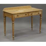 A Victorian pine side table, fitted with two drawers, height 78cm, width 106cm, depth 52cm.Buyer’s