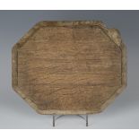 A Robert 'Mouseman' Thompson oak cheese board of canted rectangular form, one corner with typical