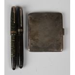 A Parker Vacumatic fountain pen with green striated casing, a Swan Caligraph fountain pen, boxed,