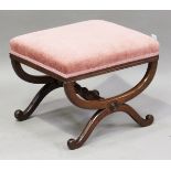 A Regency mahogany 'X' framed stool, upholstered in pink velour, height 42cm, width 55cm, depth 46cm