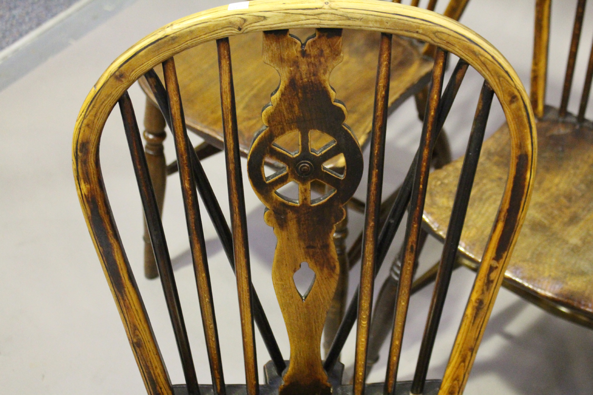 A harlequin set of four early Victorian ash and elm stick and wheel back Windsor dining chairs, - Image 6 of 9