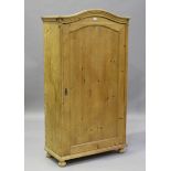 A late 19th century Continental stripped pine arched wardrobe with single door, height 170cm,