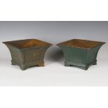 A pair of 20th century green painted cast iron garden urns of waisted square section, height 17cm,