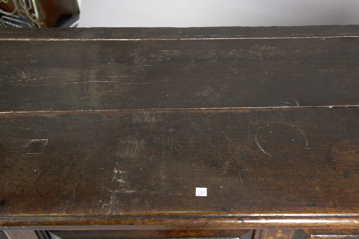 A mid-18th century provincial oak dresser base, fitted with three drawers above arched panel - Image 3 of 4