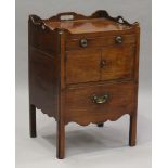 A George III mahogany night cupboard, the galleried top above two drawers and a cupboard, height