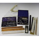 A late Victorian leather cased set of nickel technical drawing instruments, another partial set,