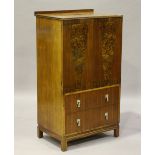 An Art Deco walnut tallboy, the two doors with angular burr walnut veneers, height 126cm, width