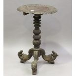 A 19th century Indian hardwood tip-top wine table, the multi-knop stem raised on tripod legs, height