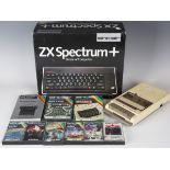 A Sinclair ZX Spectrum personal computer, boxed, together a group of games.Buyer’s Premium 29.4% (