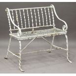 A 20th century Regency style white painted wrought iron and mesh garden bench, height 90cm, width