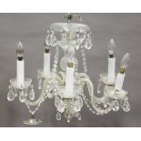 A mid-20th century clear glass five-light chandelier, height 43cm, width 55cm, together with a set