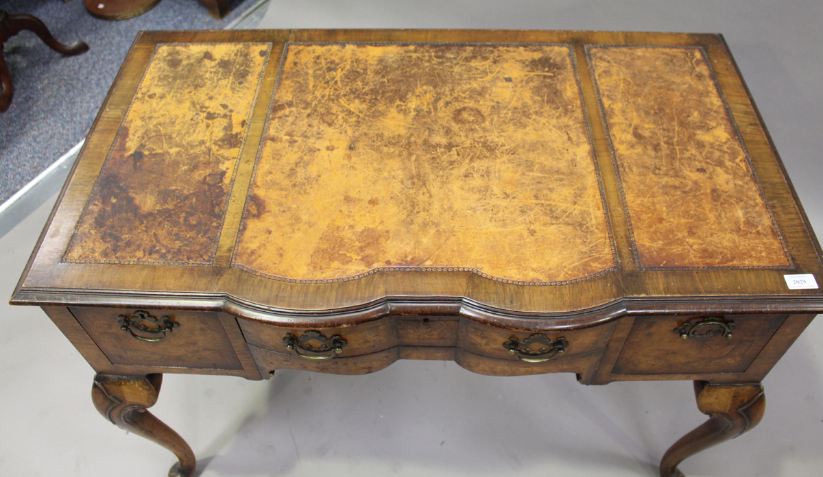 An early 20th century Queen Anne style walnut writing table, raised on carved cabriole legs, - Image 2 of 2